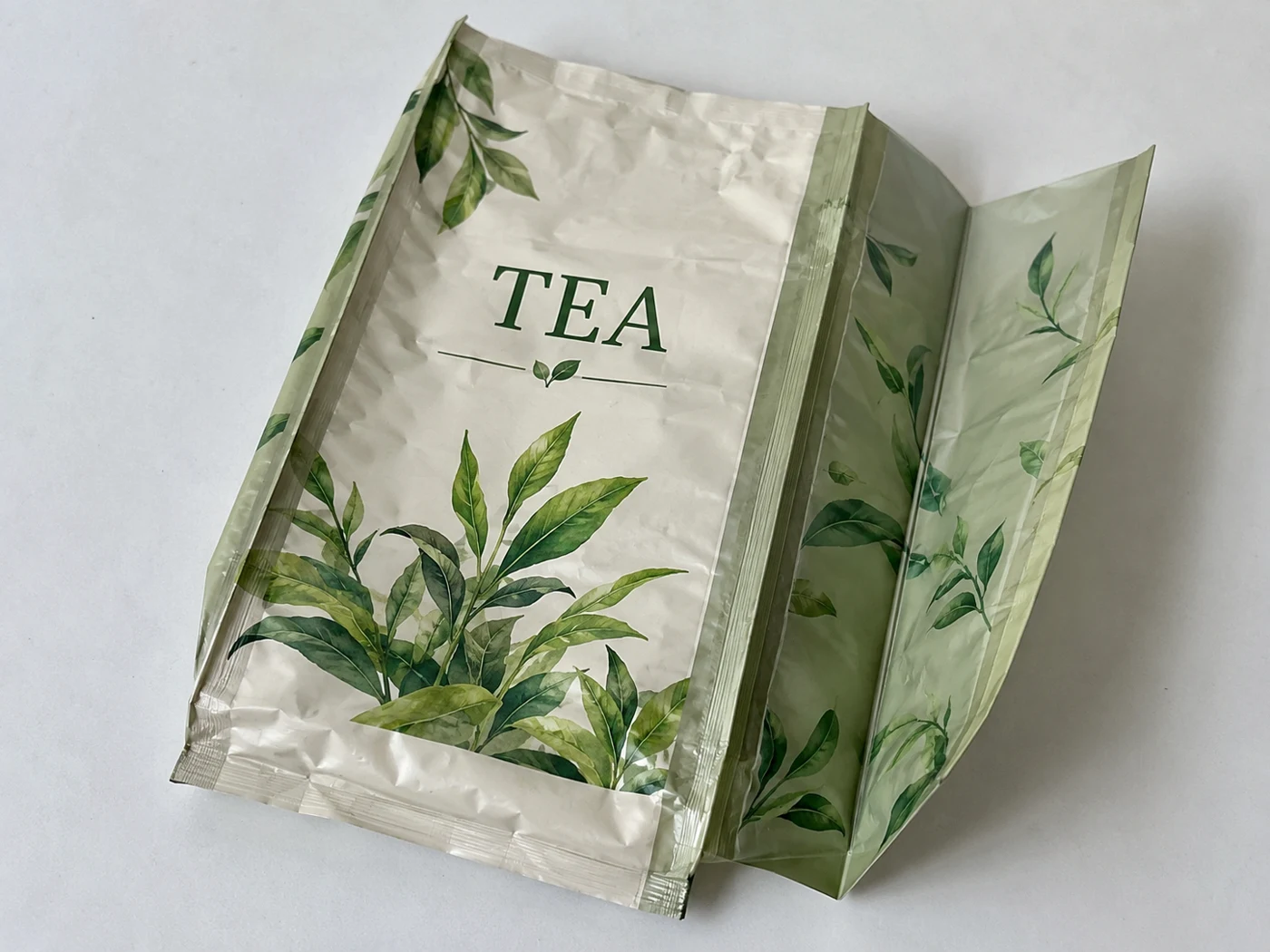 Flat empty quad seal gusset bags with tea artwork
