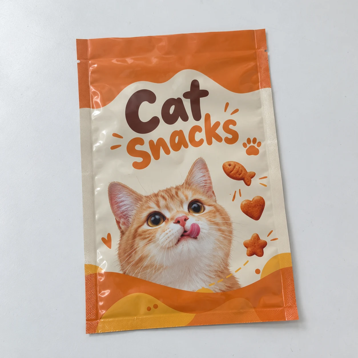 Flat empty three side seal pouches with snacks artwork